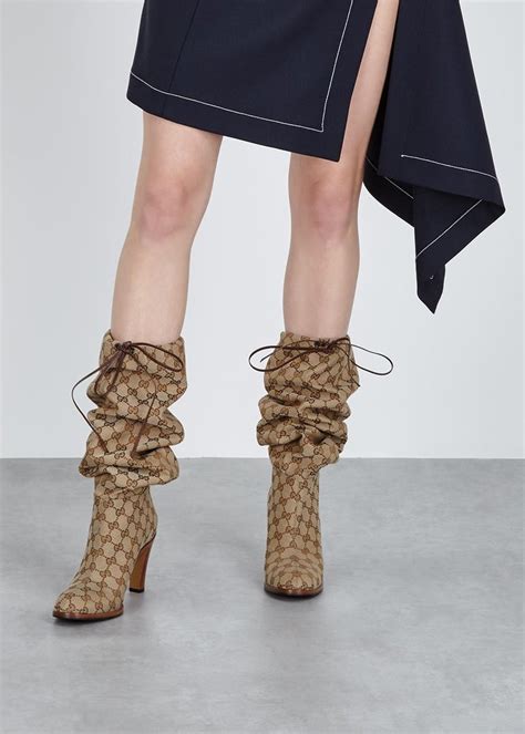 gucci monogram boots original price|Gucci thigh high boots sale.